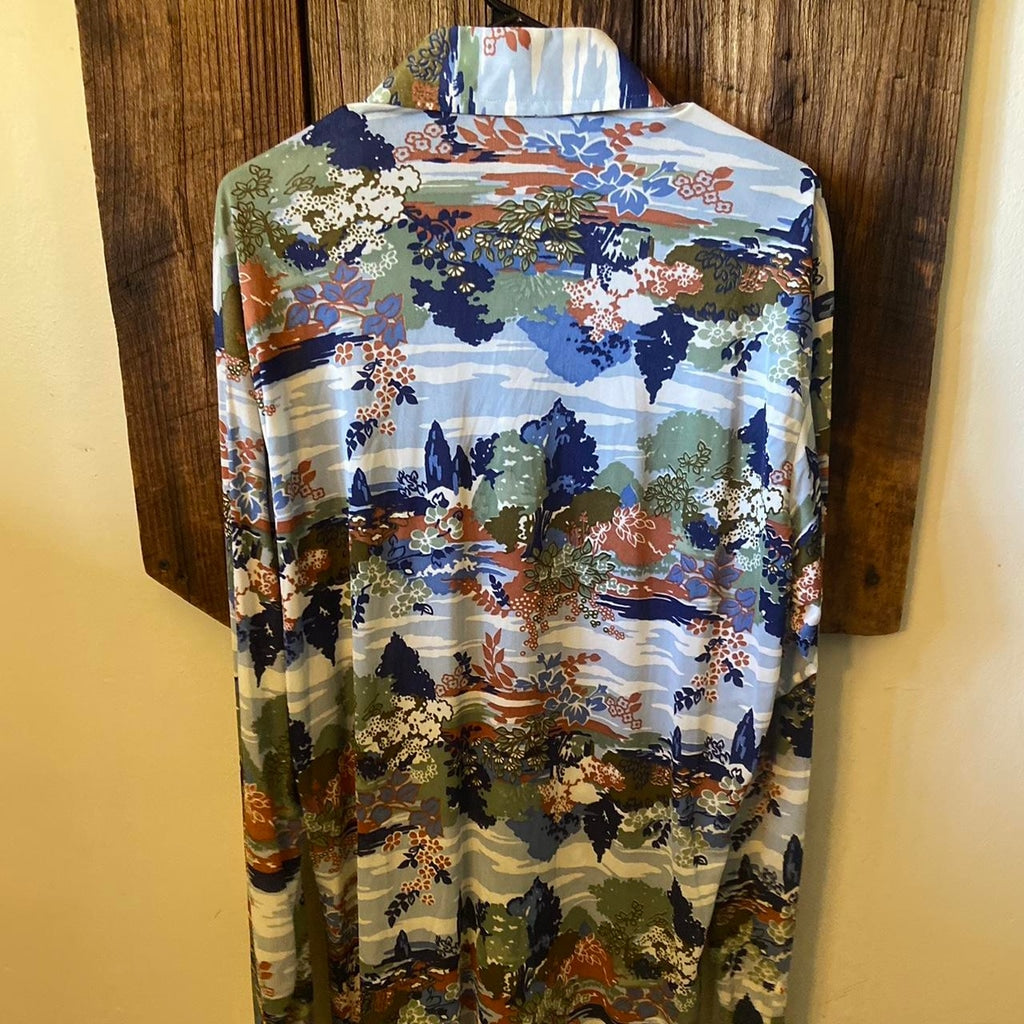 Vintage 70s floral button down shirt with a multicoloured and blue pattern #70s