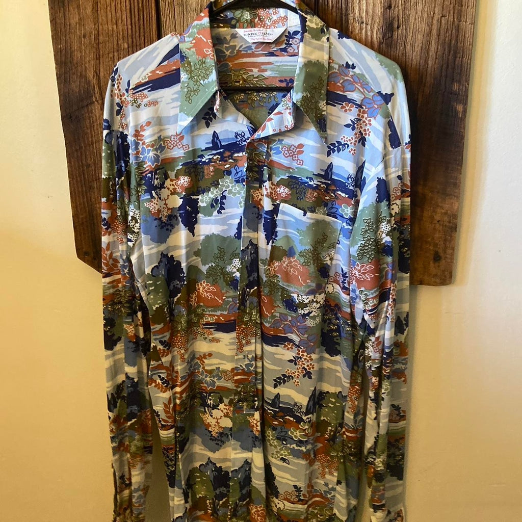 Vintage 70s floral button down shirt with a multicoloured and blue pattern #70s